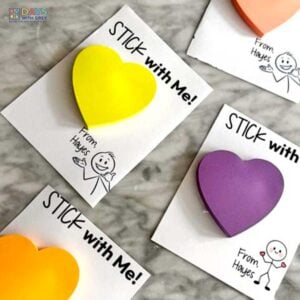 Class Valentines for kids that says, Stick with Me! and includes heart sticky notes.