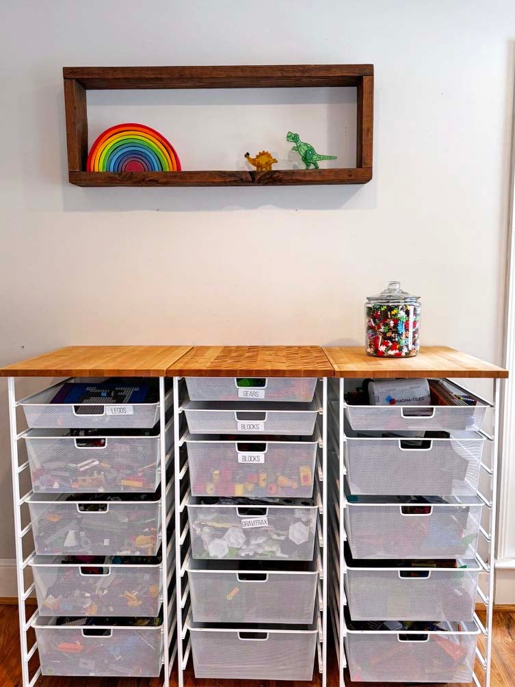 Containers for LEGOs and magnetic tiles.