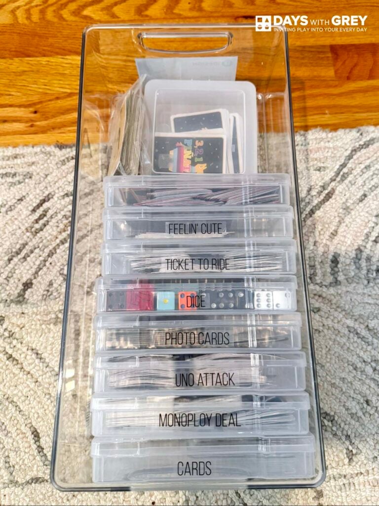 How we store card games for big kids ages 8-13 in clear plastic containers.