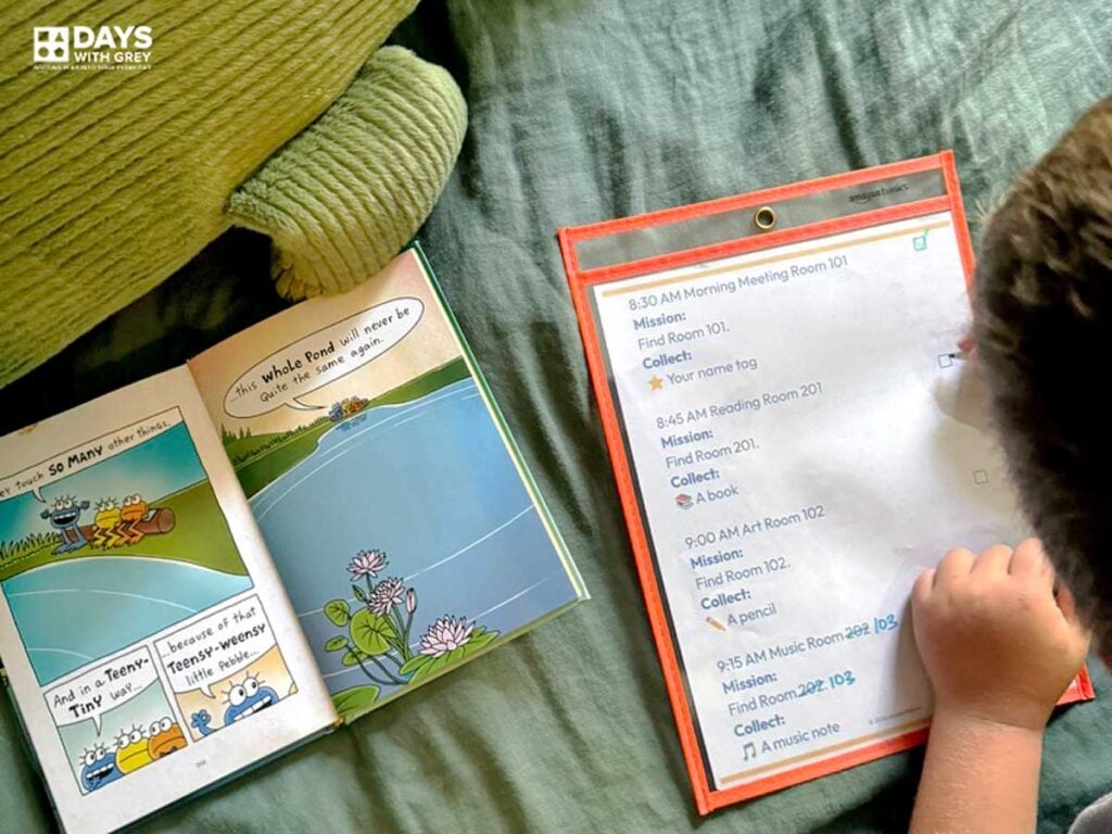 Child using a back to school checklist to find pretend classrooms around the house. In this photo, he found the reading room and is checking it off his list.